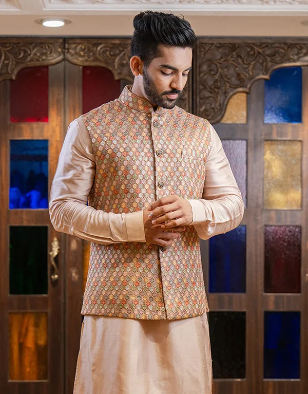 man in waistcoat kurta set with nehru jacket